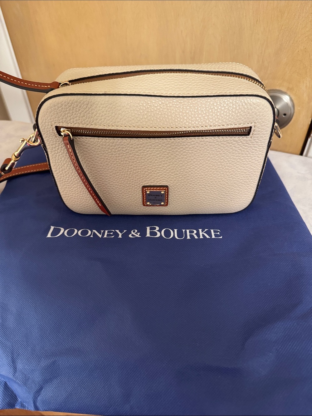 Dooney & Bourke Cream Pebbled Leather Crossbody with Brown Trim